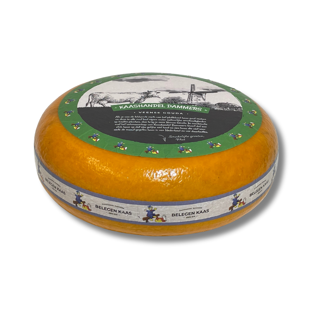 Round cheese wheel with decorative label on a white background