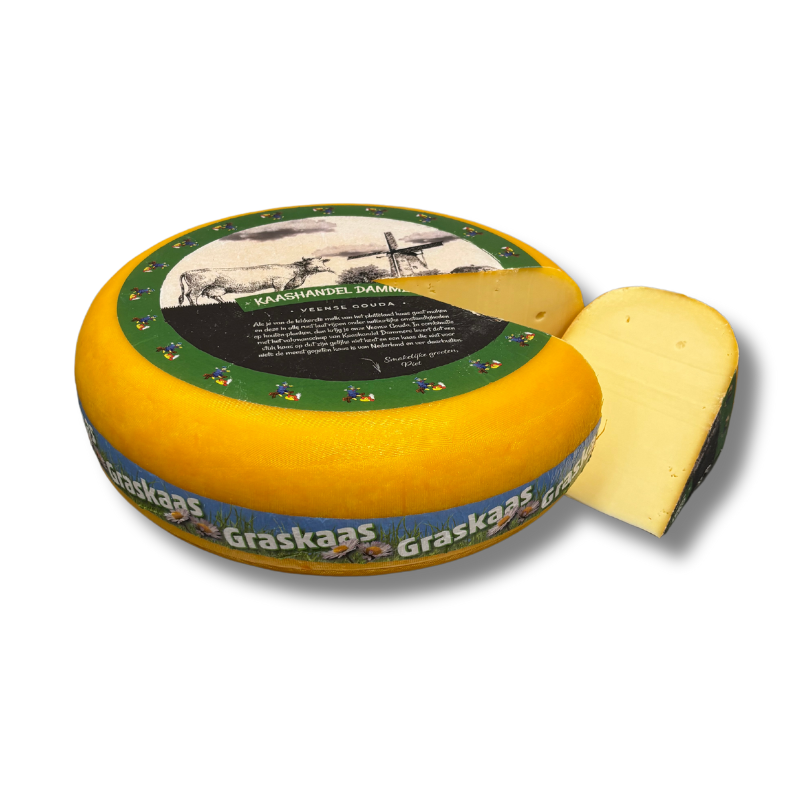 Round cheese with a slice removed, featuring a decorative label on a white background