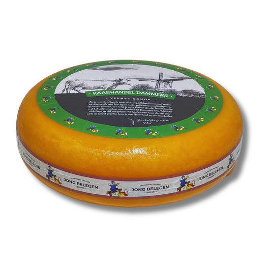 Round cheese wheel with decorative label on a white background